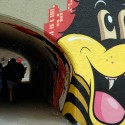 Tunnel art by Dabs Myla. Photo by Wendy Goodfriend