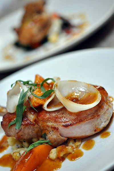 Abbots Cellar oven-roasted pork chop, caraway spaetzle, peaches and tarragon. Photo courtesy of Christian Albertson
