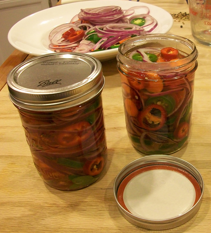 Pack vegetables snugly into jars. Photo: Joseph Wrye
