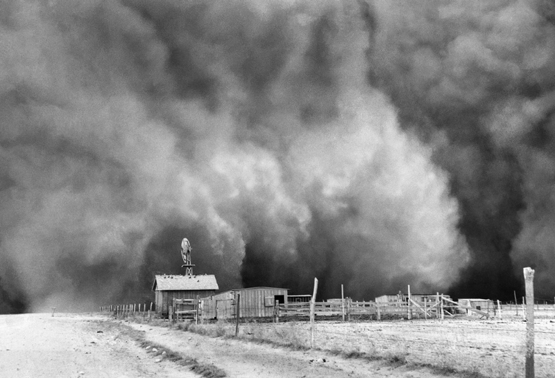 And the worst storm of all hit on Palm Sunday, April 14, 1935—a day remembered as Black Sunday. Here the storm sweeps over a farmstead on its way toward Boise City. Credit: Courtesy of Associated Press