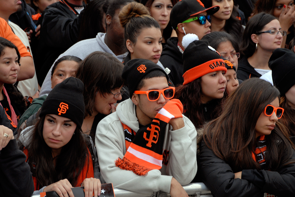 SF Giants fans sporting orange sunglasses. Photo: Wendy Goodfriend