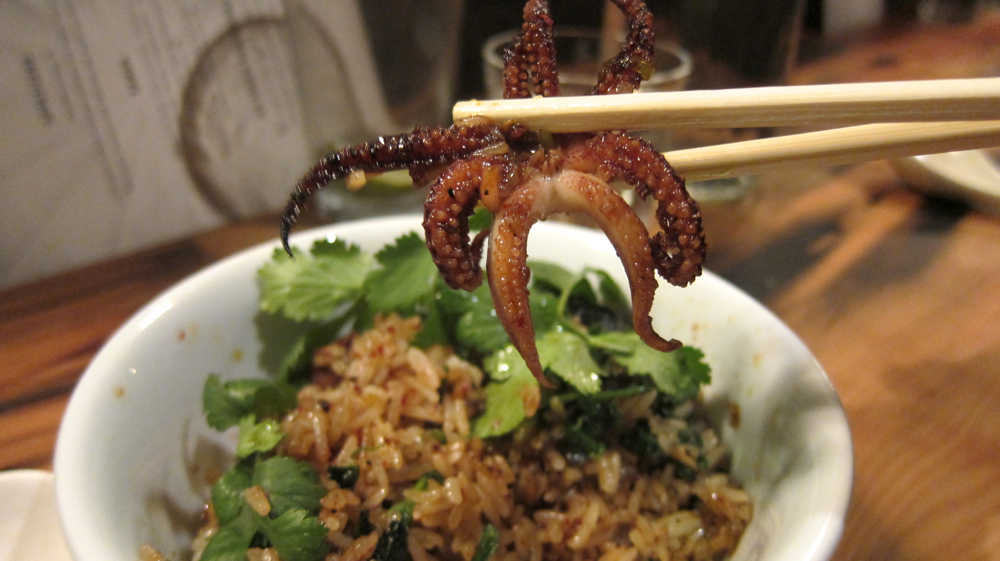 Wild nettle fried rice with Monterey Bay squid and chili paste