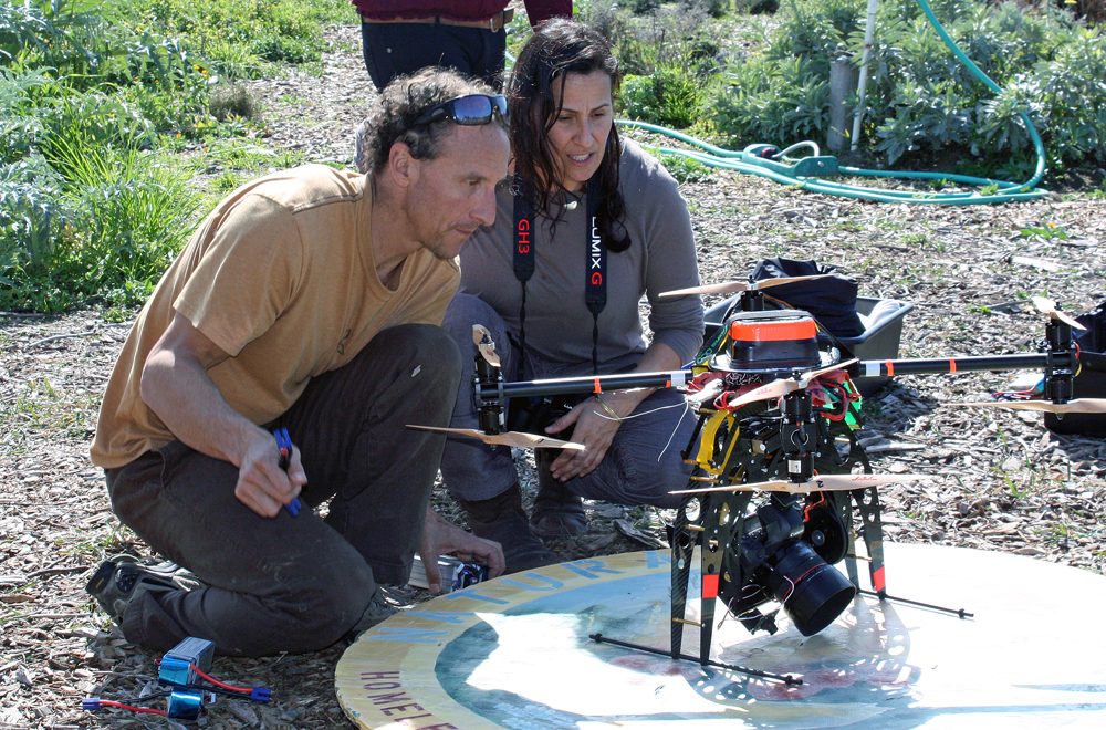 Andrea Blum with her brother Kenny, who built the remote-controlled helicopter used for the aerial photo.
