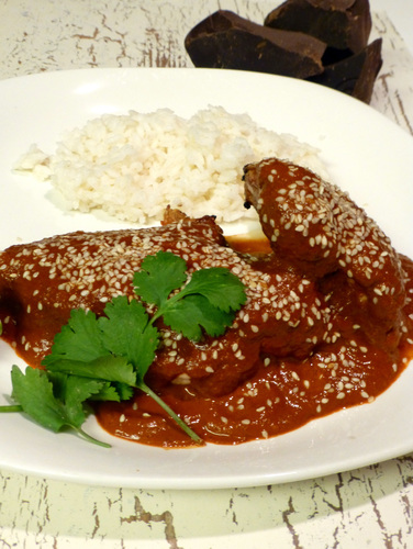 Here, Chocolate Mole is served over grilled chicken. But it's also commonly paired with pork. Photo: Peter Ogburn for NPR