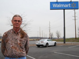 Produce broker Herman Farris, outside a Wal-Mart in Columbia, Mo., was heading to St. Louis to pick up a shipment of bananas for Wal-Mart.