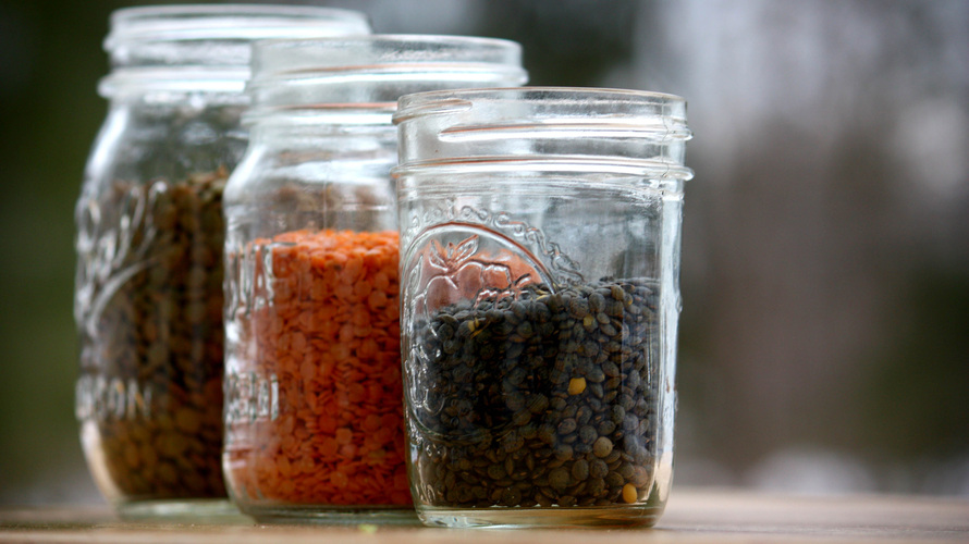 Three types of lentils in jars. Photo: T. Susan Chang for NPR