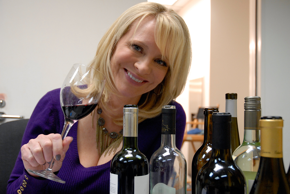 Leslie tasting wines post-taping to write wine notes that are published on the website. Photo: Wendy Goodfriend