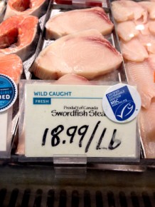 Swordfish from Canada are marked with a label from the Marine Stewardship Council at a Whole Foods in Washington, D.C. The MSC says its label means the fish were caught by a sustainable fishery, but critics says it's not always so clear. Photo: Margot Williams/NPR