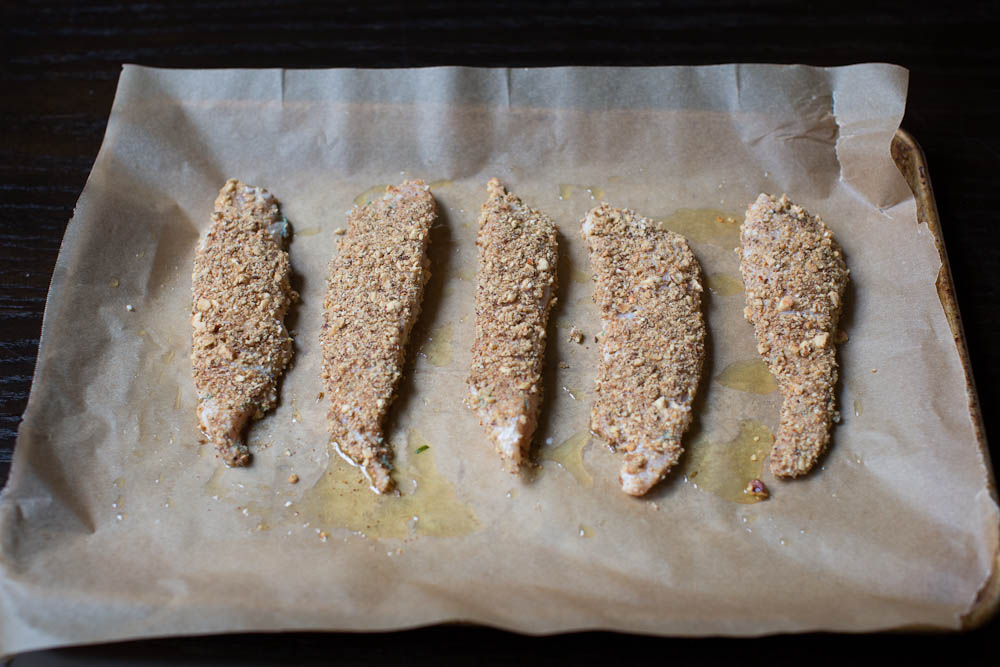 Dukkah Crusted Chicken Tenders ready for the oven