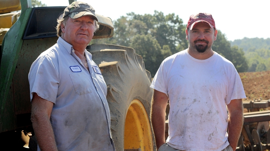 North Carolina farmers Buddy Hoffner (left) and son Chris  have been growing barley for Riverbend Malt House in Asheville since 2010. Riverbend then processes the grain into malt for use by local breweries Photo: Salisbury Post/Karissa Minn