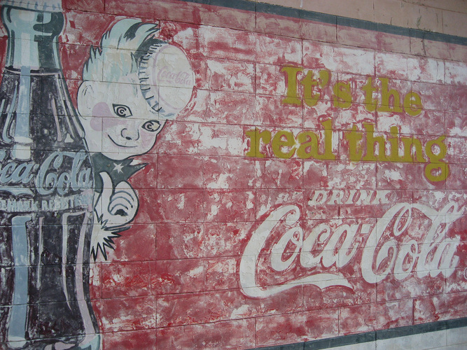 A Coca-Cola mural in Vicksburg, Miss., where the soda was first bottled in 1894. Mississippi's governor is expected to sign a bill that would prevent the regulation of soda portion sizes by counties or towns. Photo: pratt/via Flickr