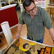 Steve Sando shows off his linen vintage movie posters. Photo: Wendy Goodfriend 