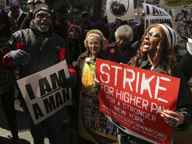 Demonstrators from the Fast Food Forward rally protest Thursday outside a Wendy's restaurant in New York City. Photo: Mary Altaffer/AP