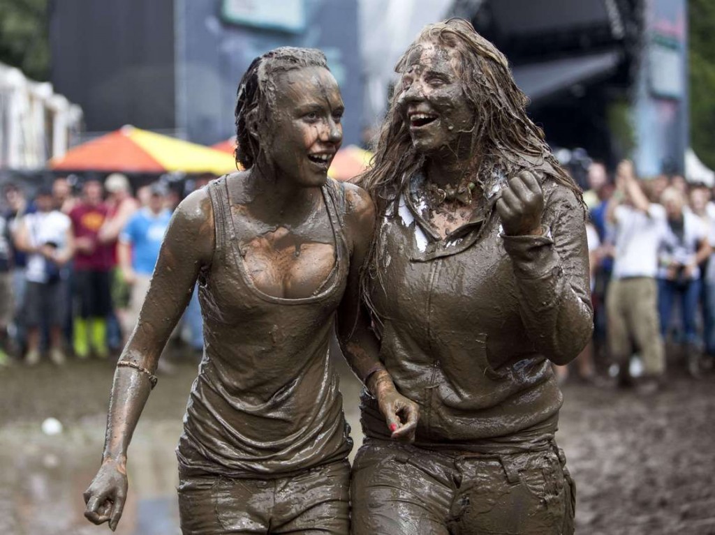 Looks like these two attendees at the 2009 Music Openair Festival St. Gallen in Switzerland couldn't resist jumping in the mud, either. Photo: Ennio Leanza/AP