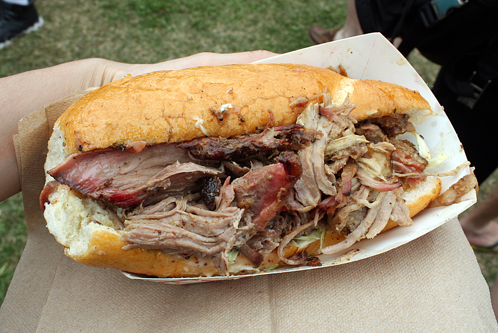 The legendary cochon de lait po' boy from the Love at First Bite catering company often sells out at Jazz Fest. Photo credit: Tilde Herrera