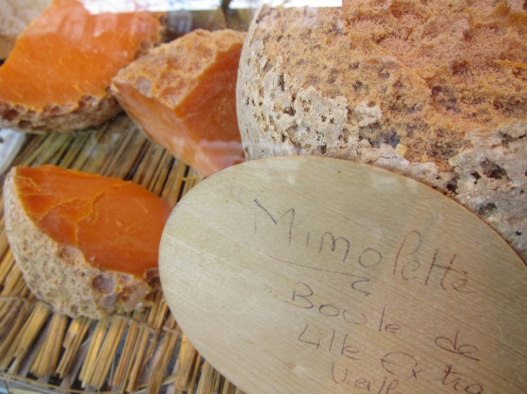 Microscopic bugs called cheese mites are responsible for giving Mimolette its distinctive rind and flavor. Photo: Chris Waits/Flickr