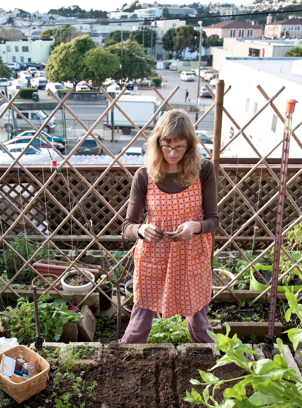 Heidi Kooy tends to produce and livestock in her Excelsior district backyard farm in San Francisco. Photo: Lori Eanes 