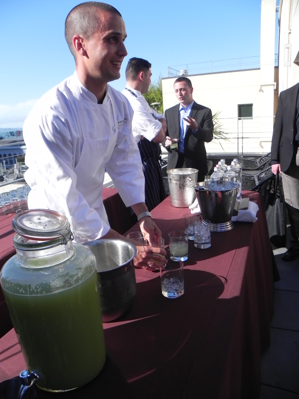 Stewart serving refreshing glasses of cucumber gin sours on a beautiful San Francisco evening.
