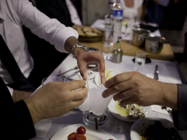 Diners drinking raki, a traditional Turkish alcoholic drink flavored with anise, at a restaurant in Istanbul. Photo: Jodi Hilton for NPR