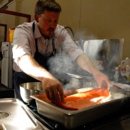 Chef Neil Davidson smoking the salmon on the stovetop. Photo: Wendy Goodfriend
