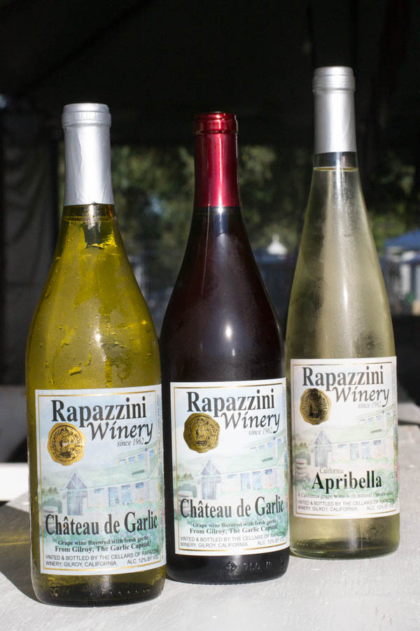 An assortment of wines by the Rapazzini Winery, based in Gilroy, Calif., including a red and a white garlic-infused wine that are available for tasting at the Gilroy Garlic Festival. Photo: Sara Bloomberg