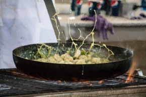 Sauce flies in a pan at the demonstration booth at the Gilroy Garlic Festival. Photo: Sara Bloomberg