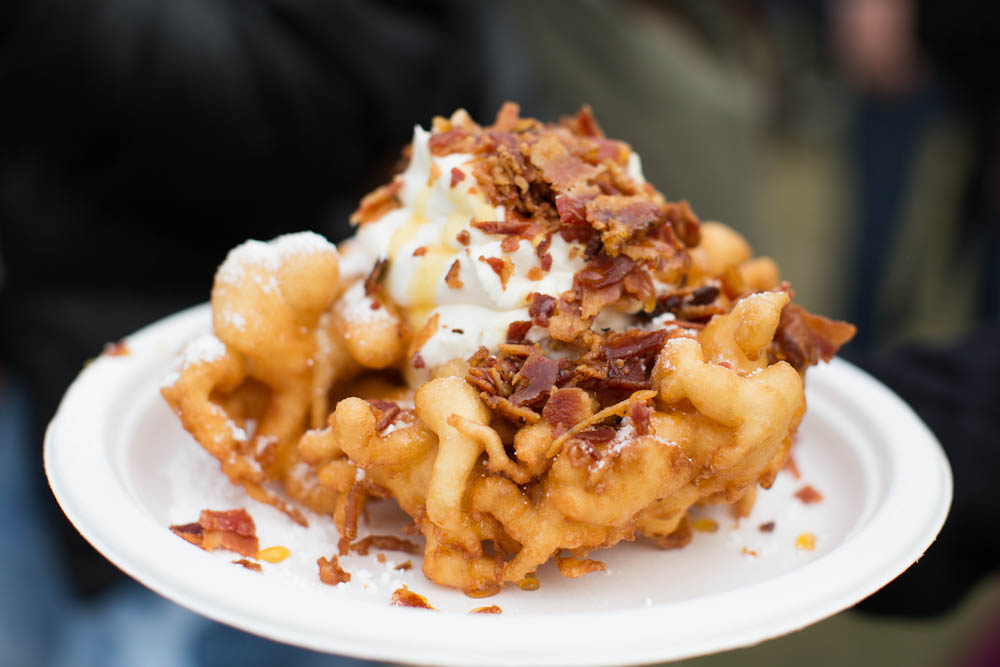 Gourmet Funnel Cakes (Endless Summer Sweets): topped with powdered sugar, whipped cream, crispy bacon, drizzled with agave syrup
