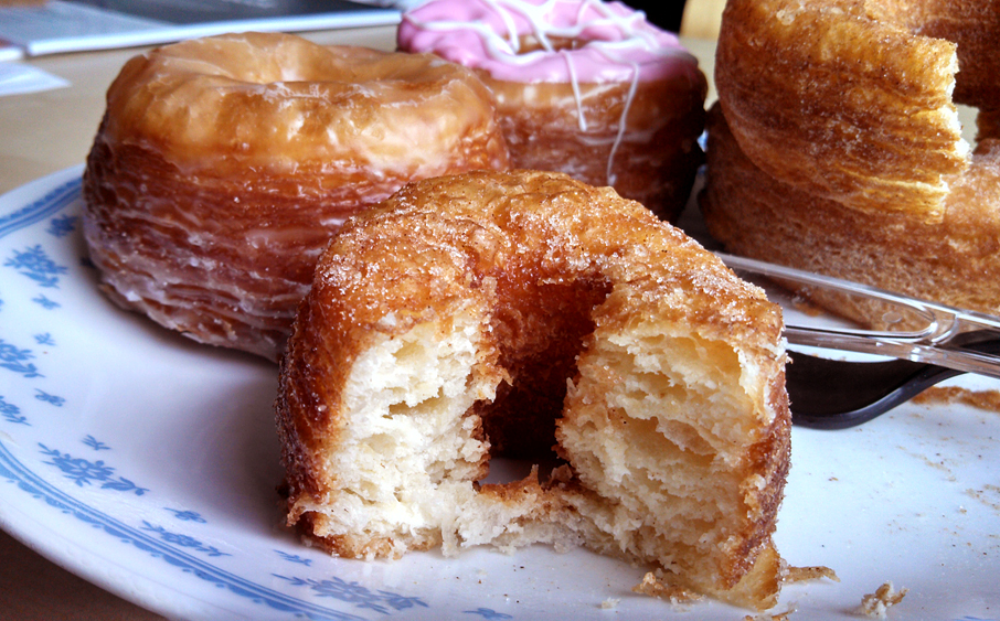 Cronuts have flaky layers, like a croissant, but are fried and iced and rolled in sugar, like a donut. Photo: Kelly O'Mara