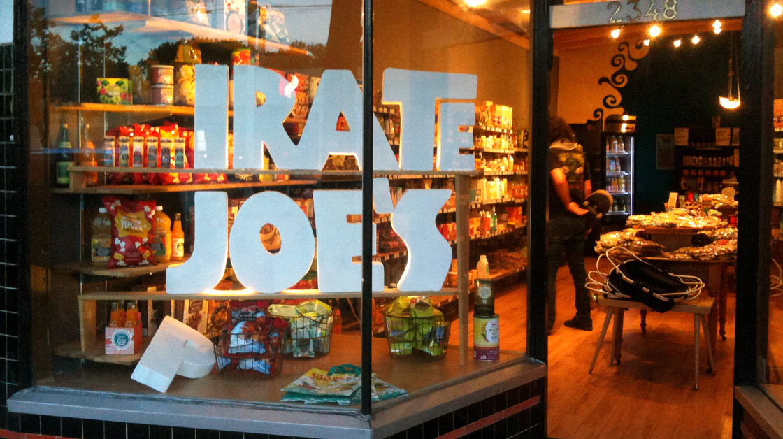 "I bought the stuff at full retail. I own it," says Michael Hallatt, owner of the _irate Joe's grocery in Vancouver. His store faces a lawsuit from Trader Joe's for infringing on its trademark and possibly confusing customers. Photo:_irate Joe's