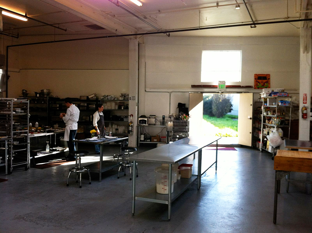 Nosh SF and SF Private Chef commercial kitchen in Bayview - with view of outdoor garden. Photo: Courtesy of Nosh SF