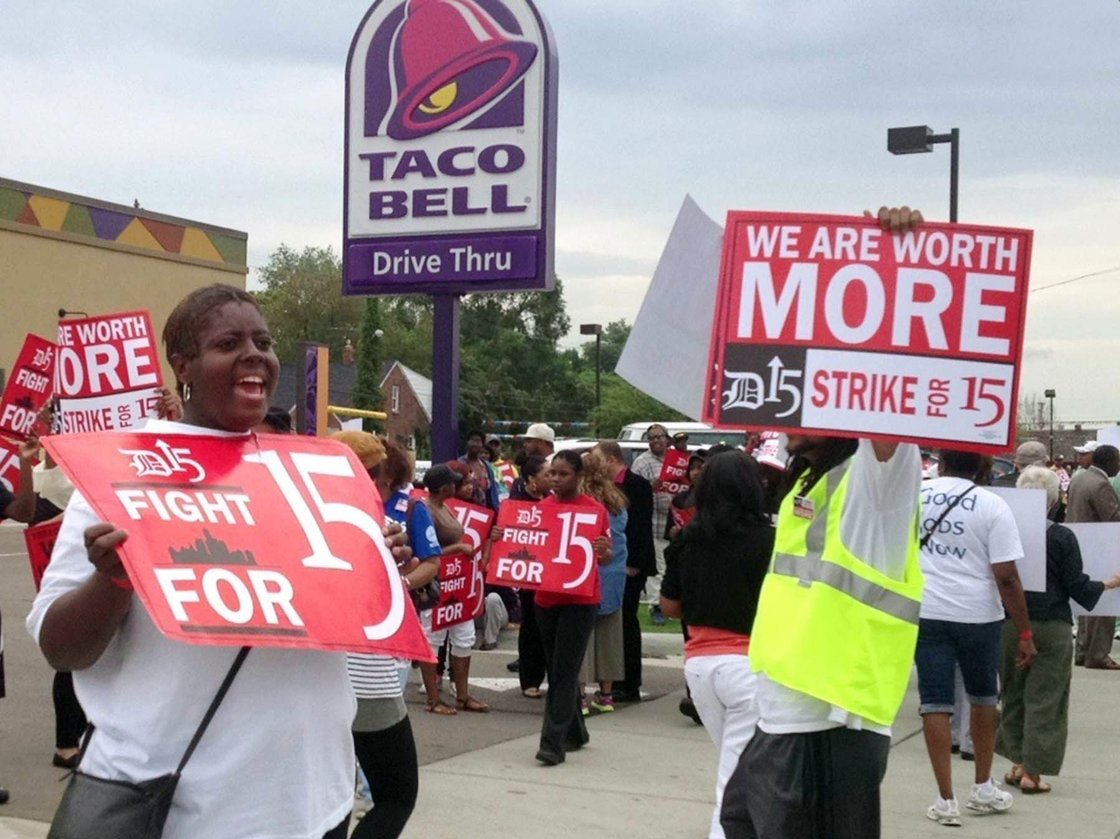 Outside a Taco Bell restaurant in Warren, Mich., early Thursday, supporters of the push by fast-food workers to raise the minimum wage were marching. Photo: Jessica J. Trevino /MCT/Landov