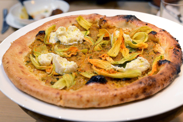 Bouli Bar’s Fiori pizza is topped with summer vegetable compote, capers, squash blossoms, and buffalo burrata ($18.50). Photo: Kate Williams