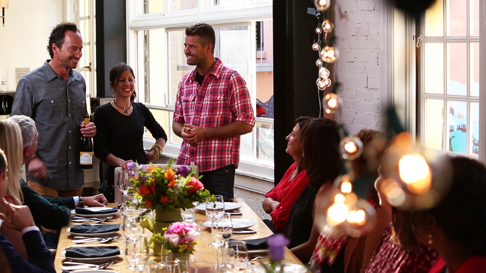Chefs Jeffrey Saad, Cortney Burns and Pete Evans with dinner guests. Photo courtesy of Moveable Feast with Fine Cooking