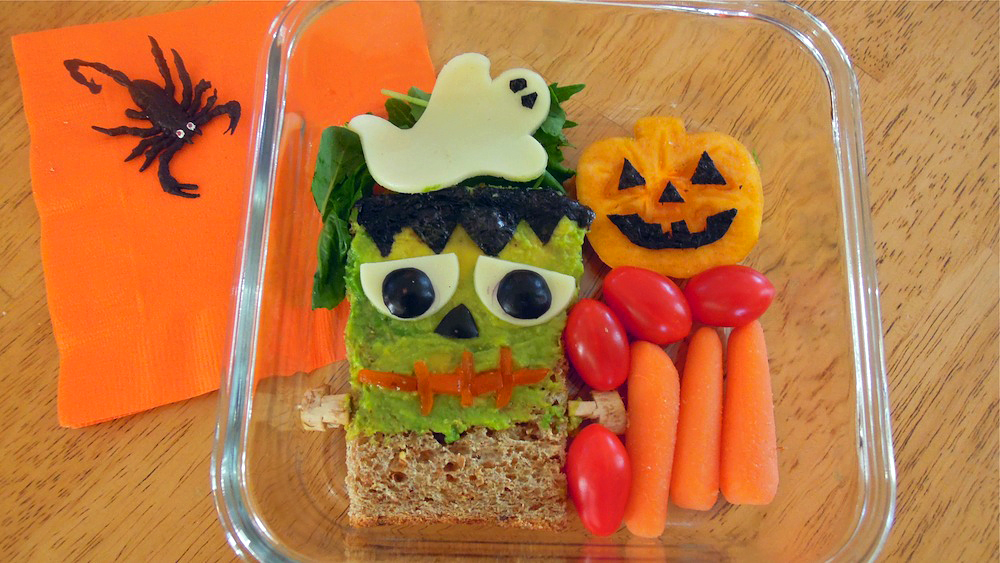 Frankenstein bento, with cheese ghost and persimmon pumpkin. Photo + Bento: Anna Mindess