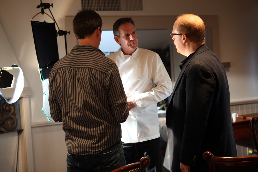 Director Joseph Levy prepares Chef Thomas Keller for his interview. Photo courtesy of Spinning Plates