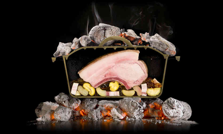 Photography or a food dramatization? An iron pot is sliced in half to show how a pork roast adsorbs heat when hot coals are placed above and below the meat. Photo: Courtesy of The Cooking Lab