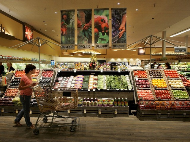 A Safeway customer browses in the fruit and vegetable section at Safeway in Livermore, Calif. Photo: Justin Sullivan/Getty Images