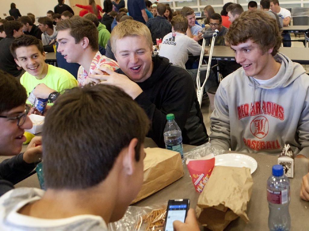 Students at Lowell High School in Michigan sit down for lunch. Shorter lunch breaks mean that many kids don't get enough time to eat and socialize. Photo: Emily Zoladz/Landov