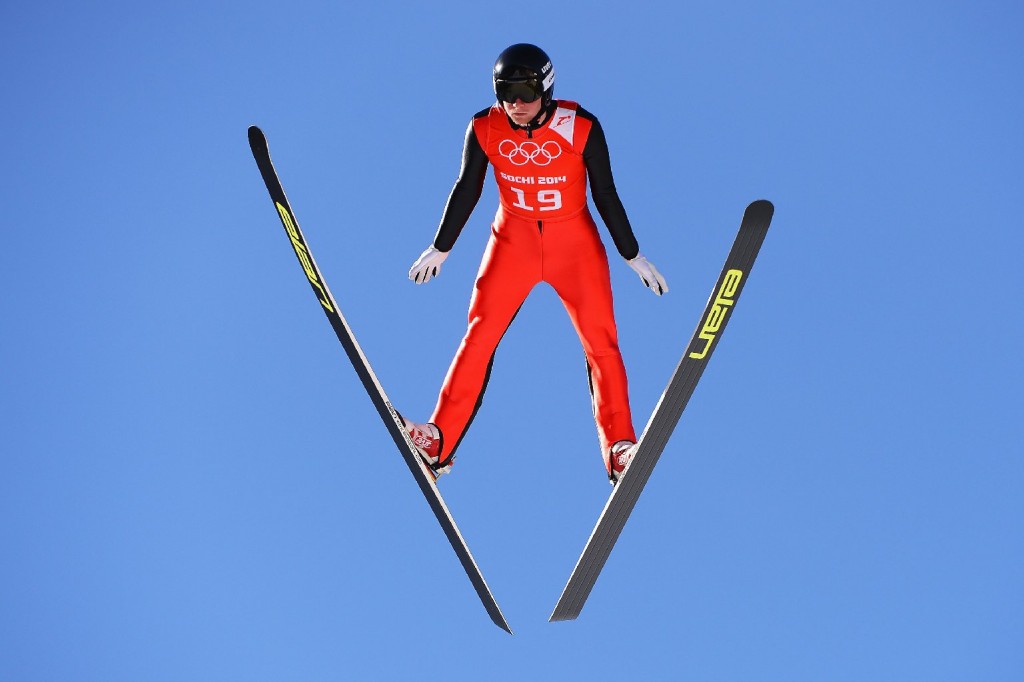 Peter Frenette of the United States jumps during training for the Men's Normal Hill Individual ahead of the start of the Sochi Games. (Lars Baron/Getty Images)