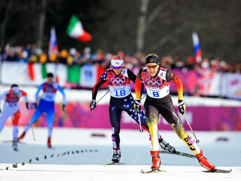 Kikkan Randall of the United States (left) and Denise Herrmann of Germany compete in the finals of the Ladies' Sprint Free during the Sochi 2014 Winter Olympics in Russia. (Richard Heathcote/Getty Images)