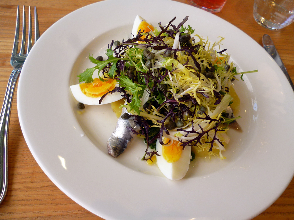 At the Shed in Healdsburg, local herring is marinated in housemade red wine vinegar and olive oil, then served in a lunchtime salad with frisee, soft-cooked egg, capers, and boiled potato. Photo: Stephanie Rosenbaum