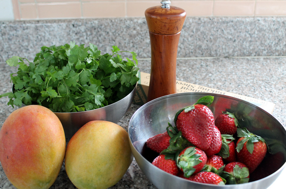 I like to pair sweet mangoes with herbaceous cilantro and strawberries with spicy black pepper. Photo: Kate Williams