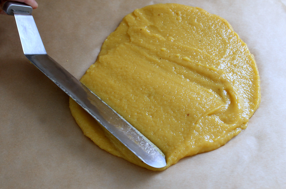 Spread the reduced puree into a large, thin rectangle using a large offset pastry spatula. Photo: Kate Williams