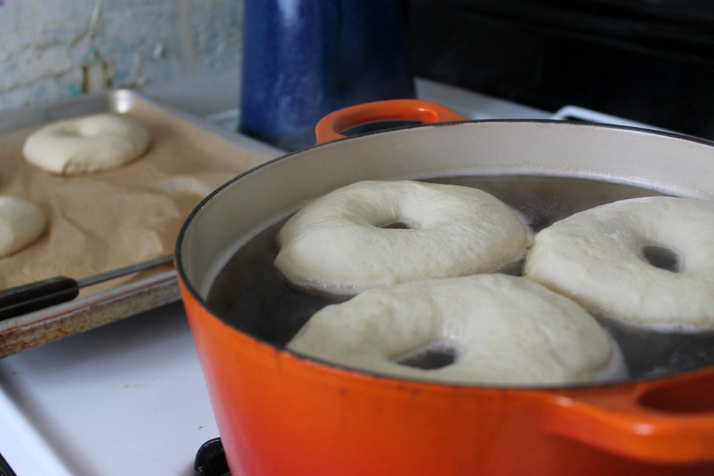 Boil the bagels in a mixture of barley malt syrup and baking soda for the best crust. Photo: Kate Williams