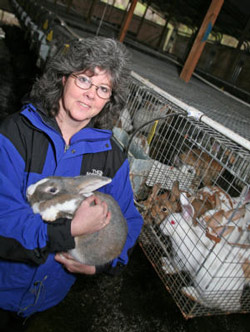 Myriam Kaplan-Pasternak with rabbits at Devil's Gulch Ranch. Photo courtesy of Devil’s Gulch Ranch