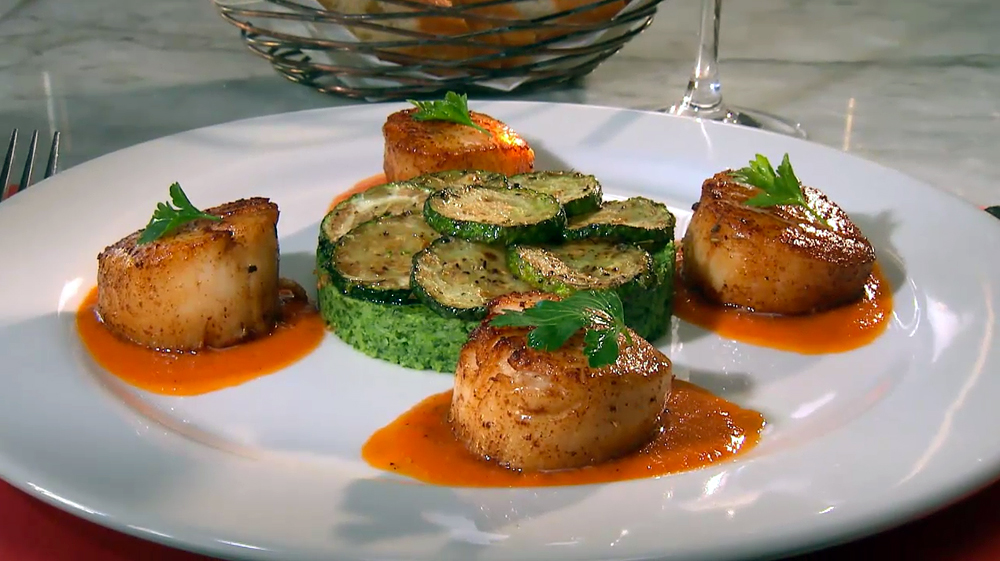 Coquilles St-Jaques au Coulis de Poivron Rouge, Puree de Brocolis and Courgettes Sautees- pan seared sea scallops with red pepper coulis, broccoli puree and sautéed zucchini at Baker Street Bistro