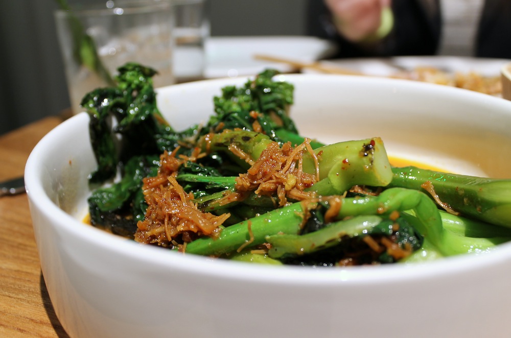 The Chinese broccoli comes sautéed and dressed with sweet and salty XO sauce. Photo: Kate Williams