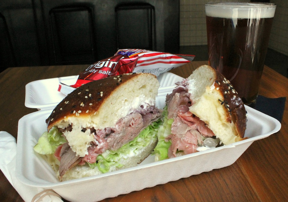 The $15 “Business Lunch Special” includes a sandwich, bag of chips, and pint of beer. Photo: Kate Williams