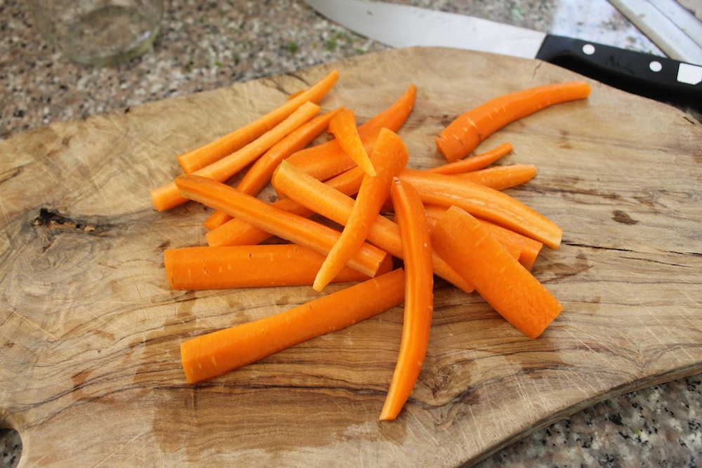Carrots should be peeled or well-scrubbed and sliced into batons around 1/4-inch thick and 3 to 4 inches long. Photo: Kate Williams