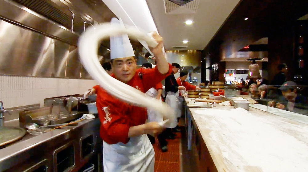 Chef Tony shows off the art of noodle pulling at M.Y. China